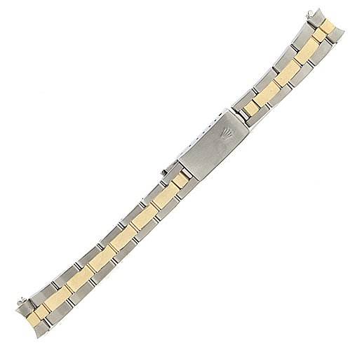 This image shows a detachable two-tone metal bracelet of a Rolex Datejust 79163 Women's Yellow Gold Champagne Dial 79163 Women's Yellow Gold Champagne Dial watch, viewed from above.