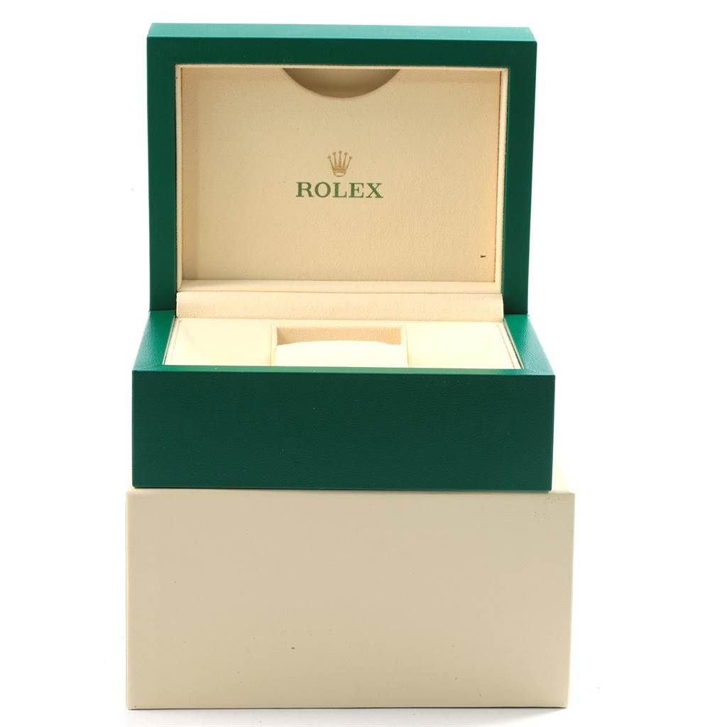 The image shows an open Rolex watch box, likely for the Datejust model, revealing its interior and the logo.