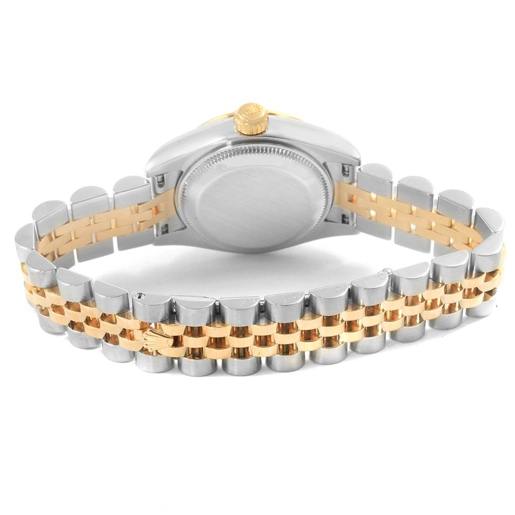 This image shows the back view of a Rolex Datejust 179173 Women's Steel and Gold (two tone) Mother of Pearl Dial 179173 Women's Steel and Gold (two tone) Mother of Pearl Dial watch, highlighting its two-tone bracelet and case back.