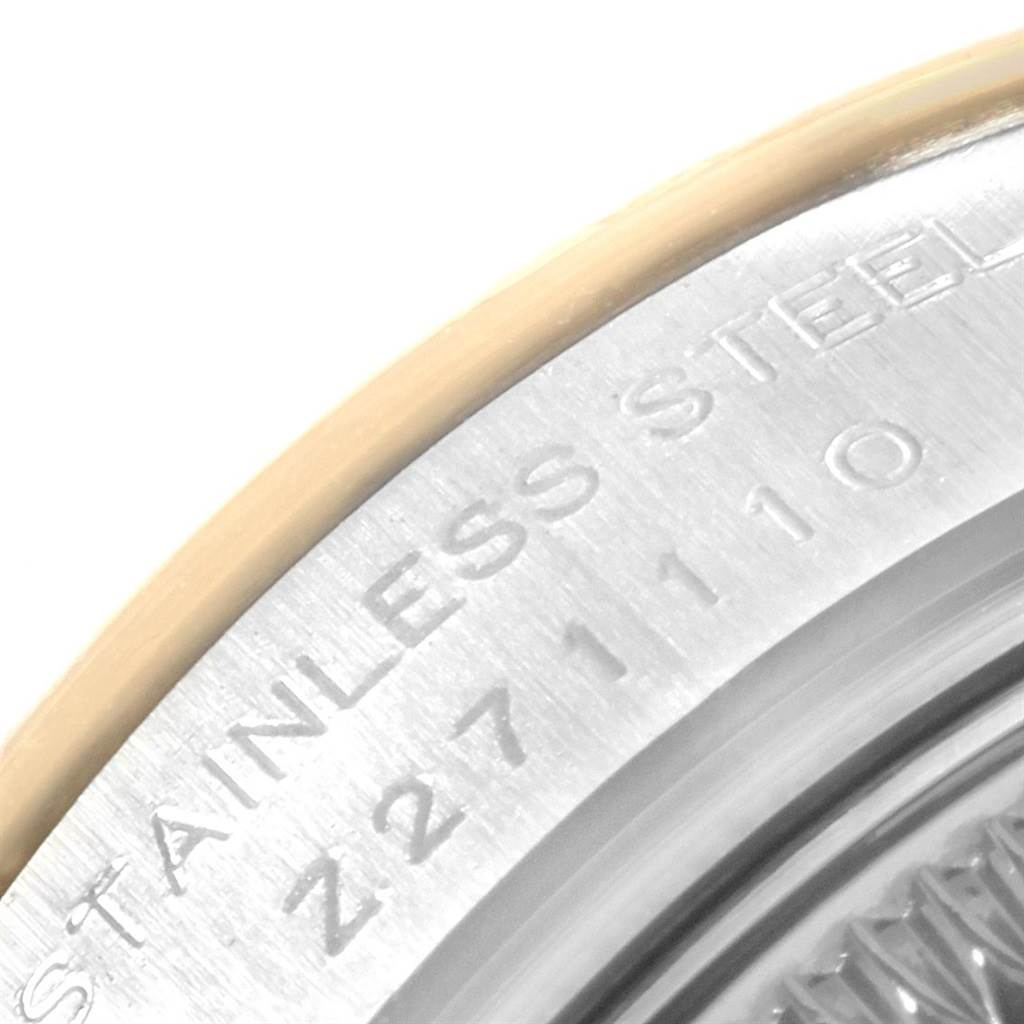 This close-up image shows the engraved stainless steel case back of a Rolex Datejust 179173 Women's Steel and Gold (two tone) Mother of Pearl Dial 179173 Women's Steel and Gold (two tone) Mother of Pearl Dial watch.