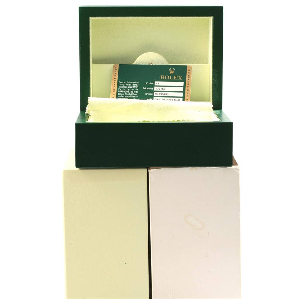 The image shows an open Rolex Datejust 179160 Women's Stainless Steel Black Dial 179160 Women's Stainless Steel Black Dial watch box, with the guarantee card and cleaning cloth inside.