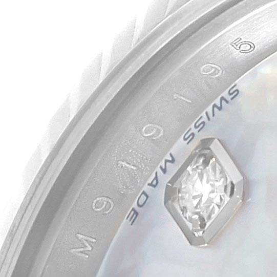 This close-up image shows the "SWISS MADE" text and diamond marker on the dial of a Rolex Datejust 179174 Women's Stainless Steel Mother of Pearl Dial 179174 Women's Stainless Steel Mother of Pearl Dial watch.