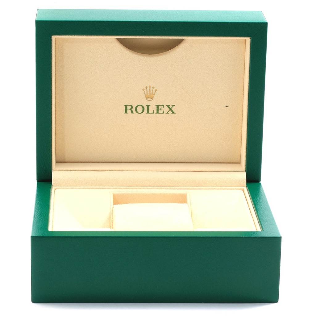 The image shows an empty Rolex Datejust 179174 Women's Stainless Steel Mother of Pearl Dial 179174 Women's Stainless Steel Mother of Pearl Dial watch box with green exterior and cream interior, featuring the Rolex logo.