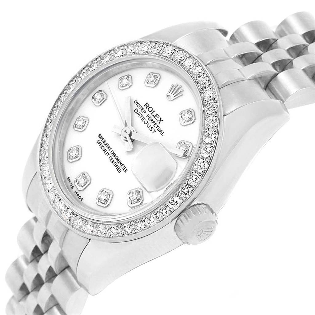 This image shows a Rolex Datejust 179384 Women's Stainless Steel White Dial 179384 Women's Stainless Steel White Dial watch at an oblique angle, highlighting the face, bezel, crown, and part of the bracelet.