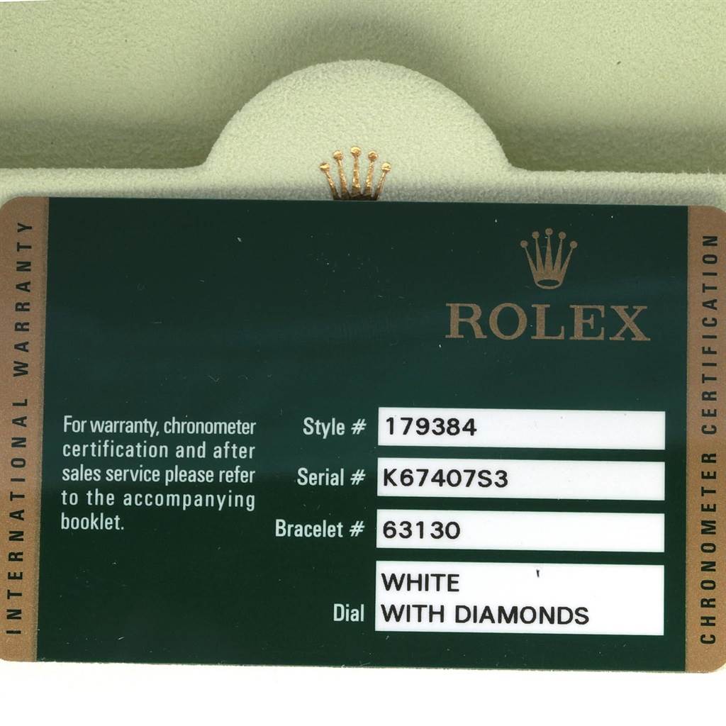 This image shows the warranty card for a Rolex Datejust 179384 Women's Stainless Steel White Dial 179384 Women's Stainless Steel White Dial watch, detailing the style, serial, bracelet numbers, and dial description.