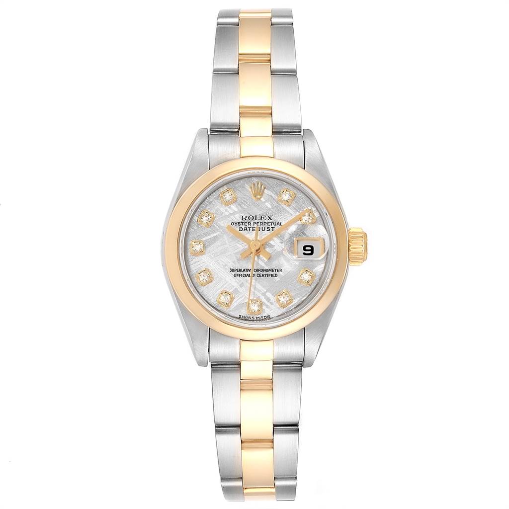 This Rolex Datejust 79163 Women's Steel and Gold (two tone) Silver Dial 79163 Women's Steel and Gold (two tone) Silver Dial watch is shown from a front angle, highlighting its dial, bezel, and two-tone bracelet.