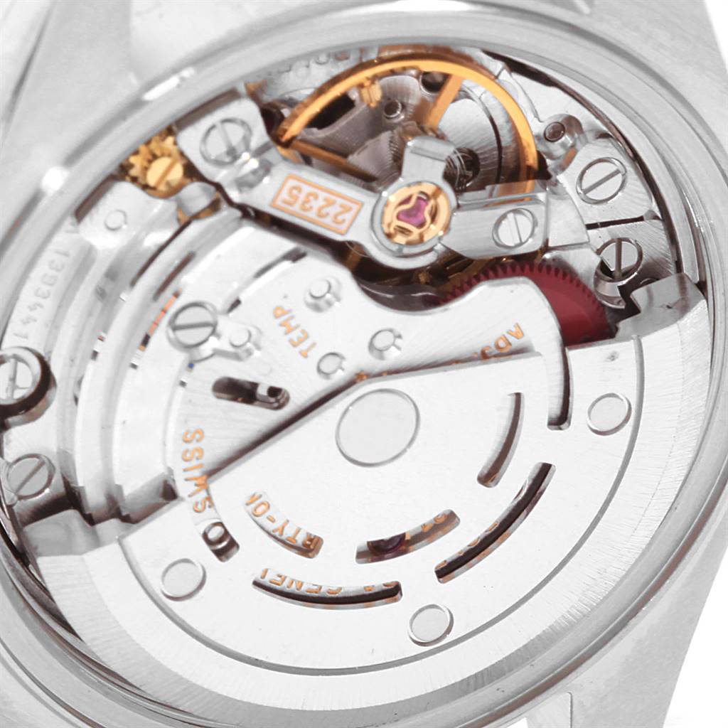 The image shows the internal movement mechanism of a Rolex Datejust 79163 Women's Steel and Gold (two tone) Silver Dial 79163 Women's Steel and Gold (two tone) Silver Dial watch from a close-up angle.
