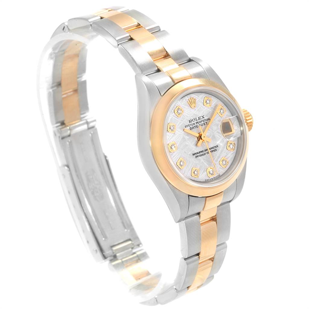 The image shows a side angle of a Rolex Datejust 79163 Women's Steel and Gold (two tone) Silver Dial 79163 Women's Steel and Gold (two tone) Silver Dial watch, highlighting its two-tone bracelet and diamond hour markers on the dial.