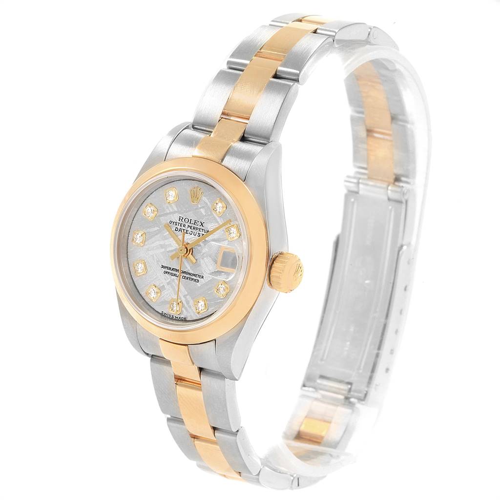 The image shows a Rolex Datejust 79163 Women's Steel and Gold (two tone) Silver Dial 79163 Women's Steel and Gold (two tone) Silver Dial watch at a three-quarter angle, highlighting its face, bezel, crown, and two-tone bracelet.