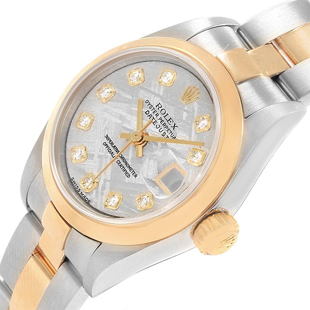 The image shows a close-up of a Rolex Datejust 79163 Women's Steel and Gold (two tone) Silver Dial 79163 Women's Steel and Gold (two tone) Silver Dial watch, featuring the dial, crown, and bracelet links at an angled view.