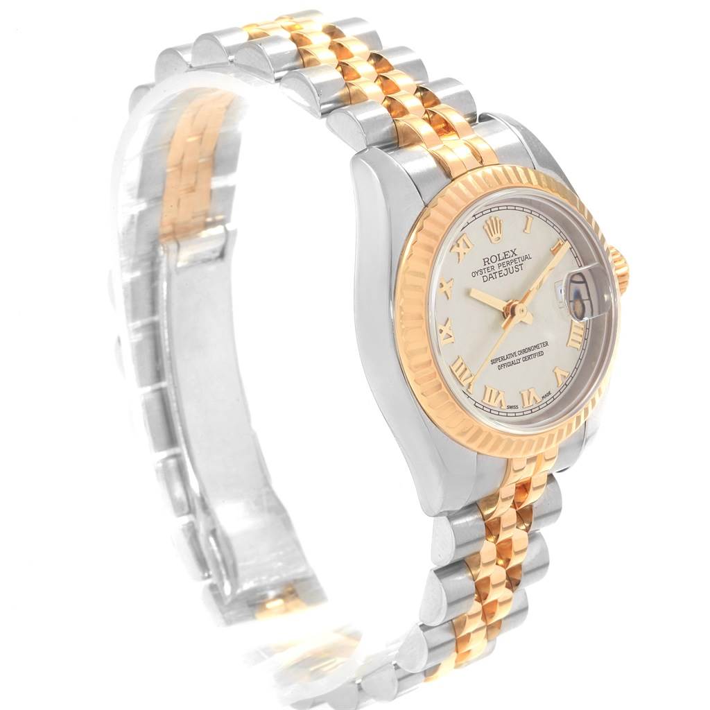 The Rolex Datejust 179173 Women's Steel and Gold (two tone) Beige Dial 179173 Women's Steel and Gold (two tone) Beige Dial watch is shown at a slight angle, displaying its jubilee bracelet, two-tone bezel, and dial.