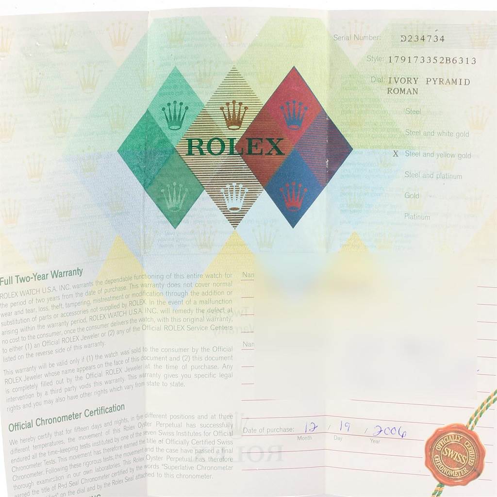 This image shows the paperwork for a Rolex Datejust 179173 Women's Steel and Gold (two tone) Beige Dial 179173 Women's Steel and Gold (two tone) Beige Dial watch, featuring warranty details and a certificate of authenticity.