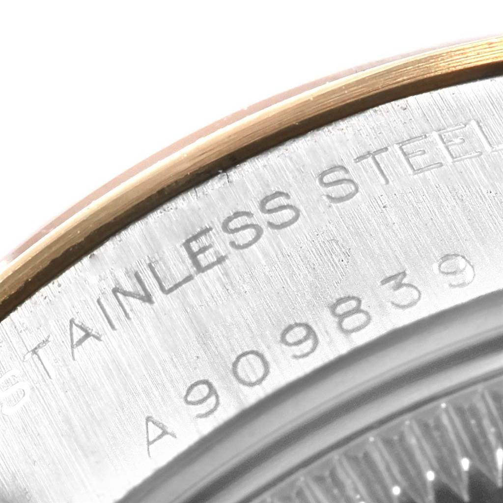 This image shows a close-up of the serial number and stainless steel engraving on the case back of a Rolex Datejust 79163 Women's Steel and Gold (two tone) Grey Dial 79163 Women's Steel and Gold (two tone) Grey Dial watch.