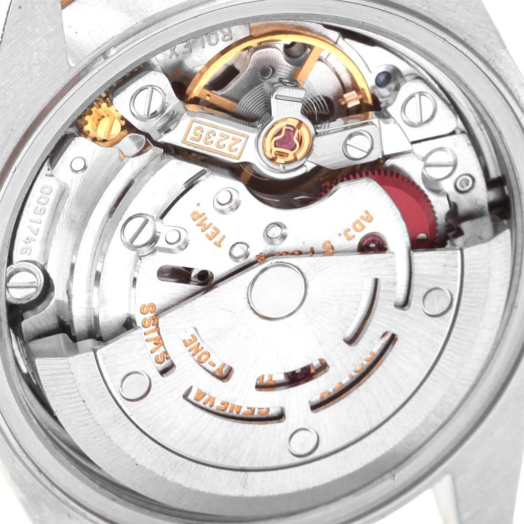 The image shows the intricate internal movement mechanism of a Rolex Datejust 79163 Women's Steel and Gold (two tone) Grey Dial 79163 Women's Steel and Gold (two tone) Grey Dial watch viewed from the back.