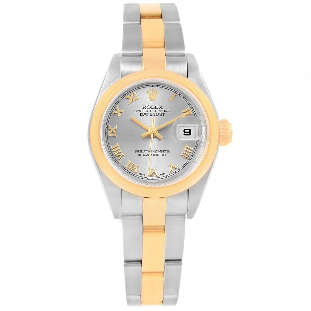 This image shows the Rolex Datejust 79163 Women's Steel and Gold (two tone) Grey Dial 79163 Women's Steel and Gold (two tone) Grey Dial watch, featuring a two-tone bracelet, a silver dial, and a date display at the 3 o'clock position.