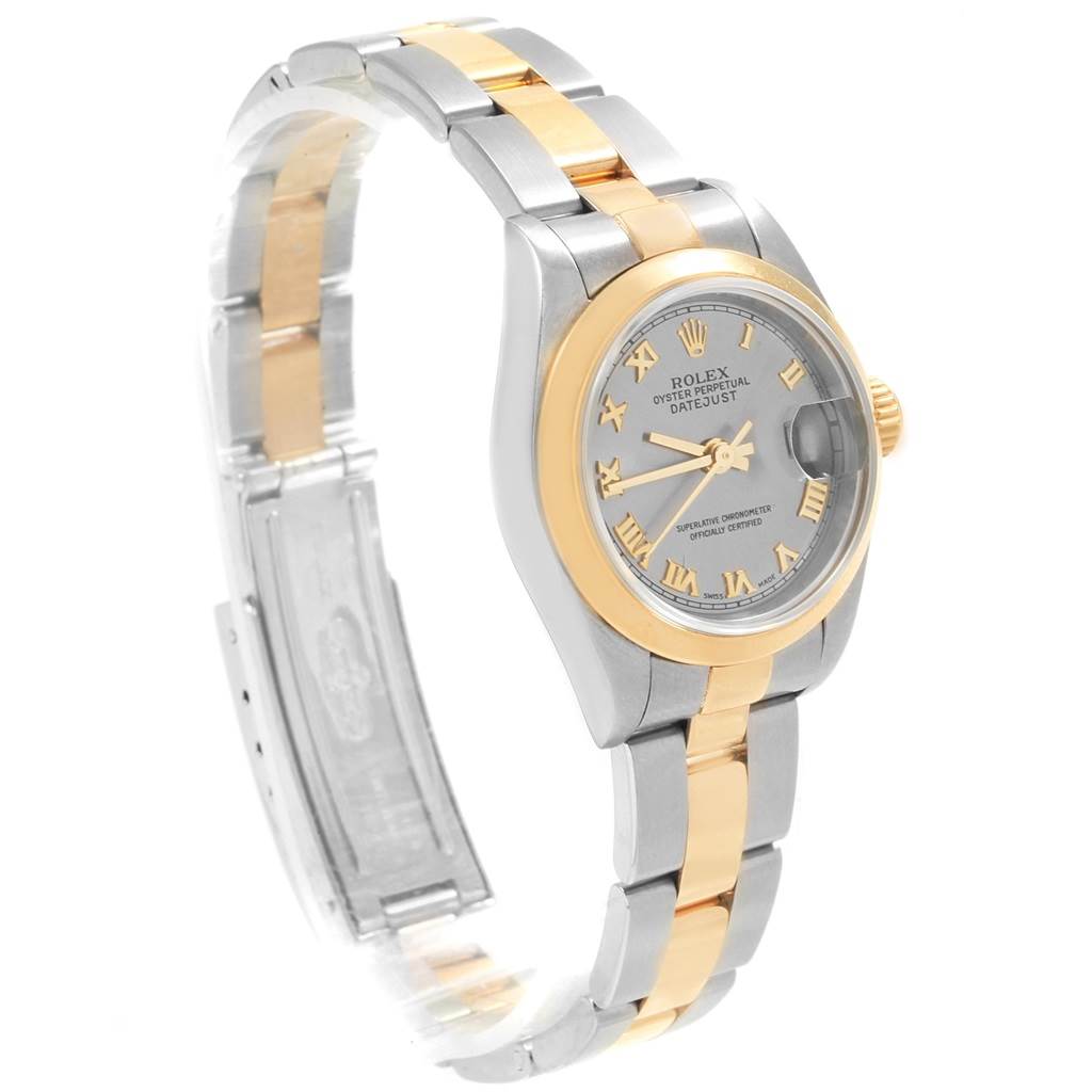 This image shows a side angle of a Rolex Datejust 79163 Women's Steel and Gold (two tone) Grey Dial 79163 Women's Steel and Gold (two tone) Grey Dial watch, highlighting its two-tone bracelet and Roman numeral dial.