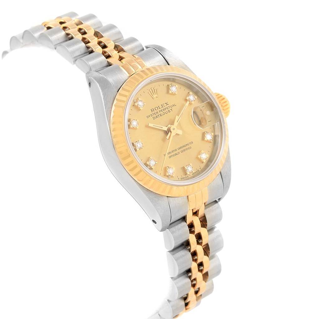 The image shows a Rolex Datejust 69173 Women's Stainless Steel Champagne Dial 69173 Women's Stainless Steel Champagne Dial watch at an angled side view, displaying its gold and stainless steel bracelet, bezel, and diamond dial.