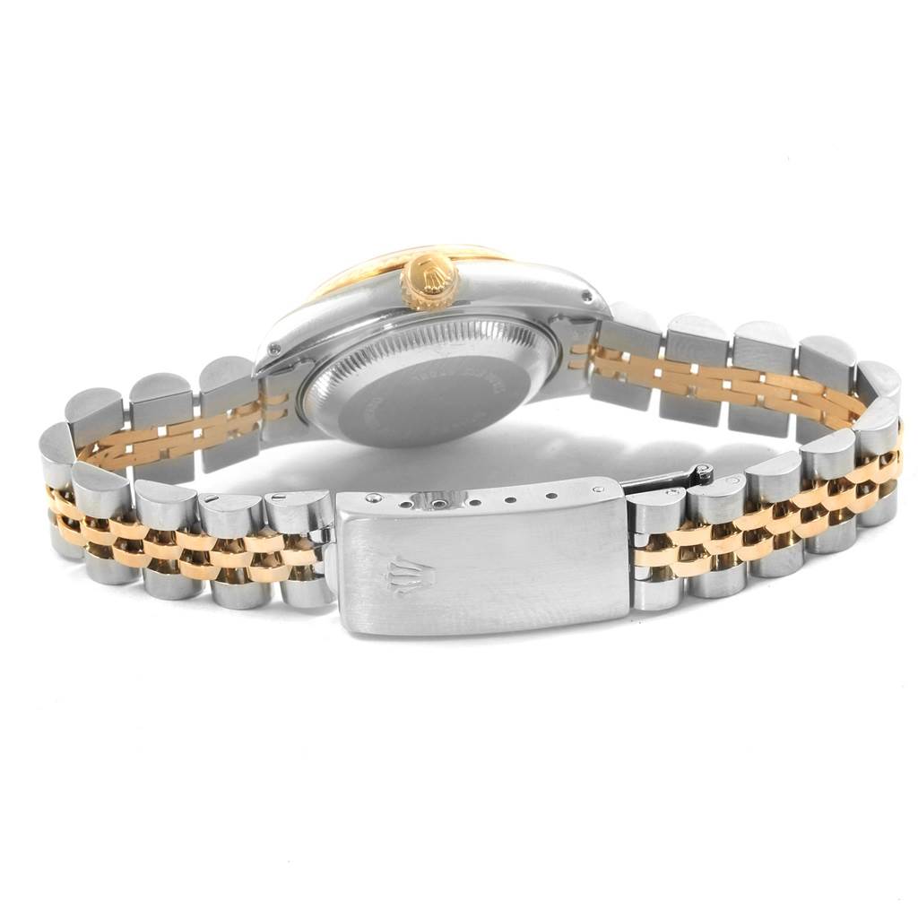 The image shows the back view of a Rolex Datejust 69173 Women
s Stainless Steel Champagne Dial 69173 Women
s Stainless Steel Champagne Dial watch, highlighting the case back, crown, and two-tone bracelet with clasp.