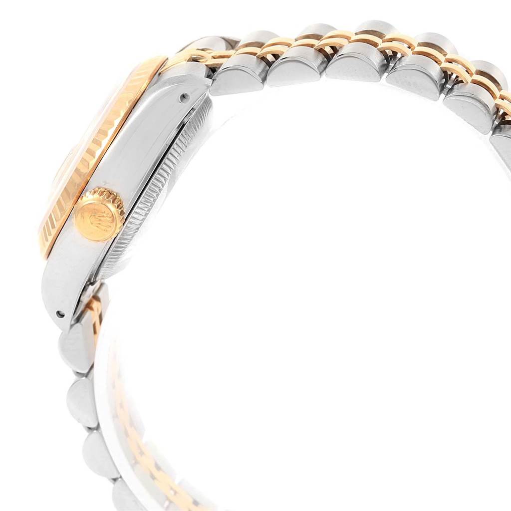 This image shows a side profile of the Rolex Datejust 69173 Women
s Stainless Steel Champagne Dial 69173 Women
s Stainless Steel Champagne Dial watch, highlighting the case, crown, and two-tone bracelet.