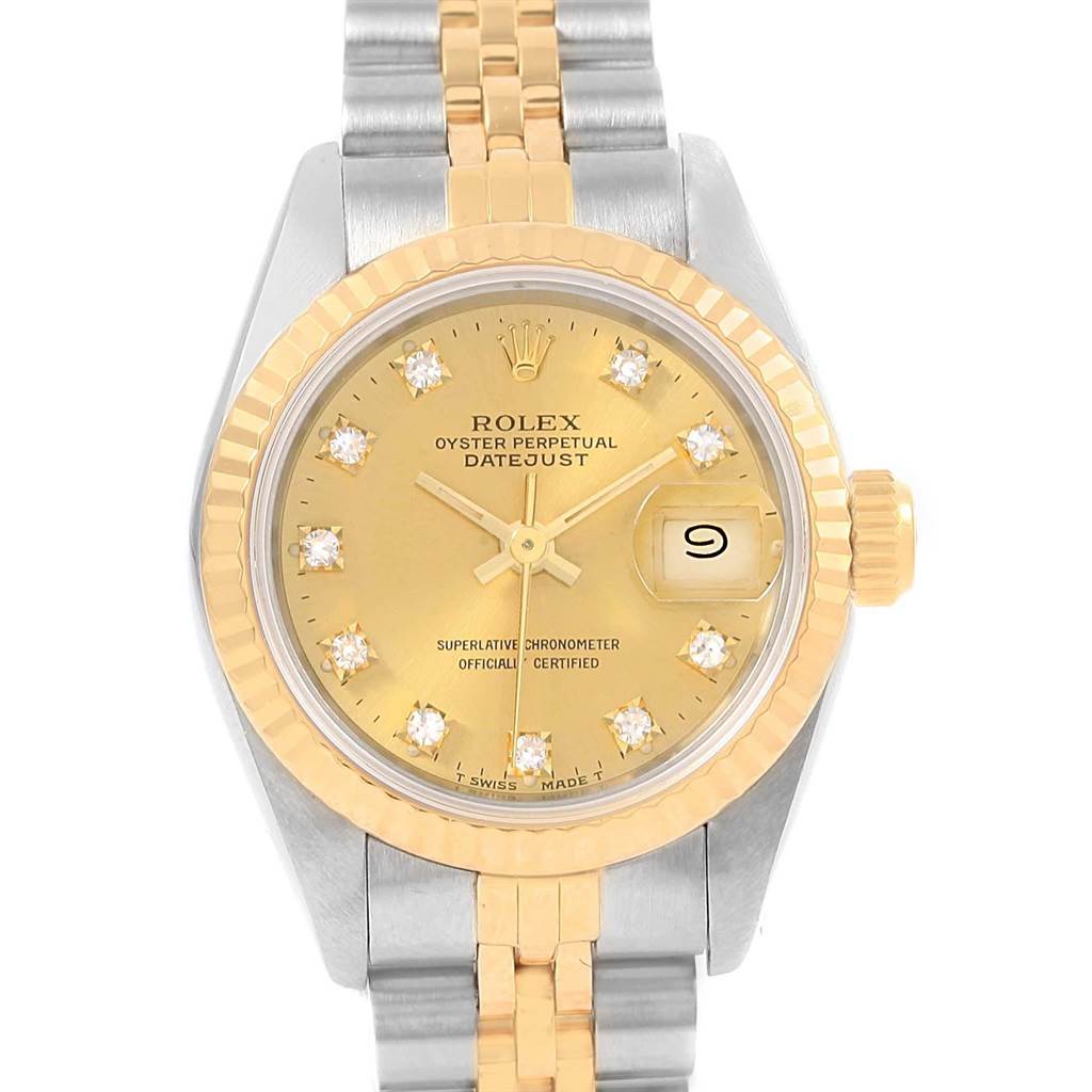 The image shows a Rolex Datejust 69173 Women
s Stainless Steel Champagne Dial 69173 Women
s Stainless Steel Champagne Dial watch from a front angle, highlighting the gold dial, fluted bezel, and two-tone bracelet.