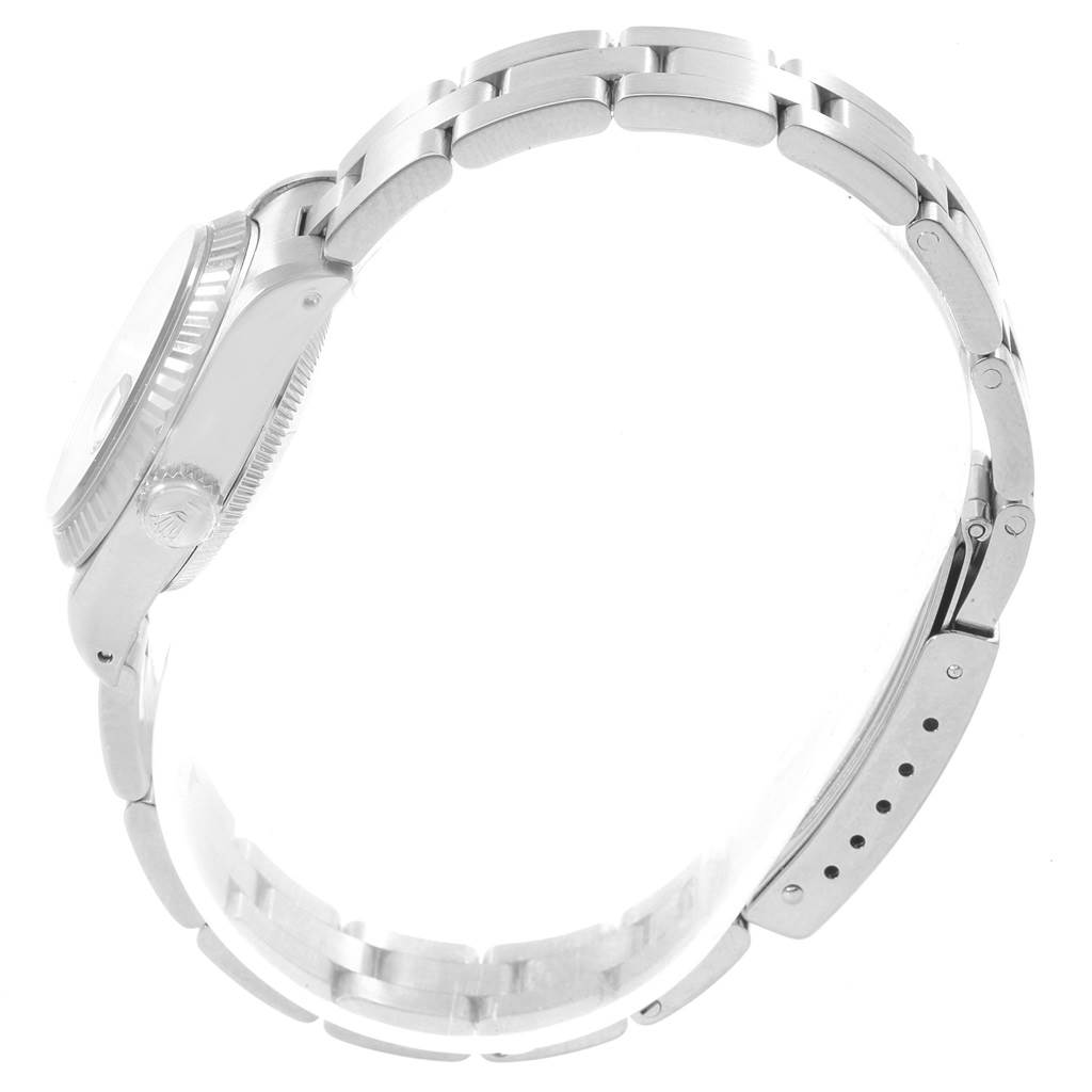 This image shows the side profile of a Rolex Datejust 69174 Women's Stainless Steel Silver Dial 69174 Women's Stainless Steel Silver Dial watch, focusing on the case, crown, and bracelet.