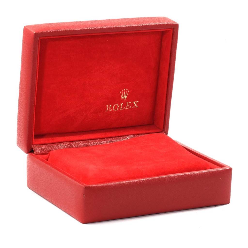 This image displays an open red Rolex watch box for the Datejust model, showcasing the interior lining and "Rolex" logo.