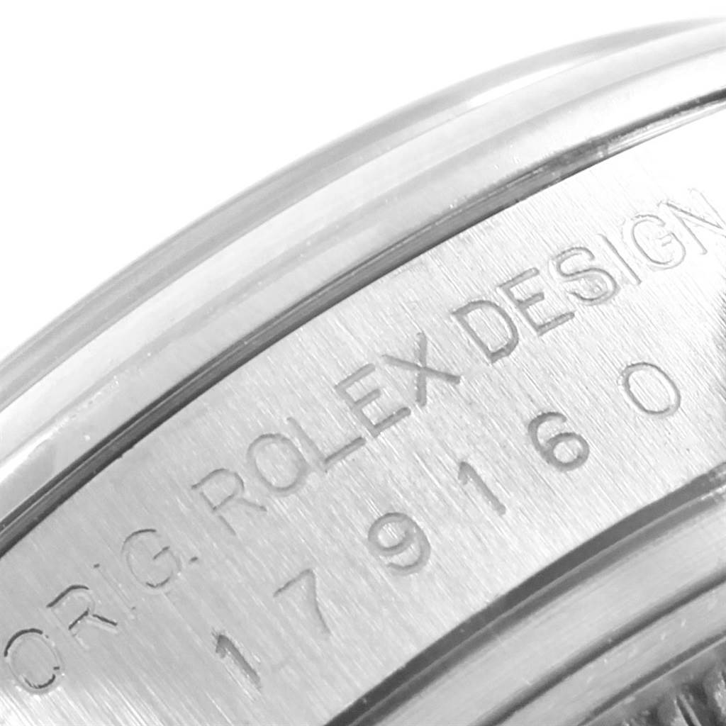 The image shows a close-up of the engraved serial number and "Rolex Design" marking on the case of a Rolex Datejust 179160 Women's Stainless Steel Blue Dial 179160 Women's Stainless Steel Blue Dial watch.