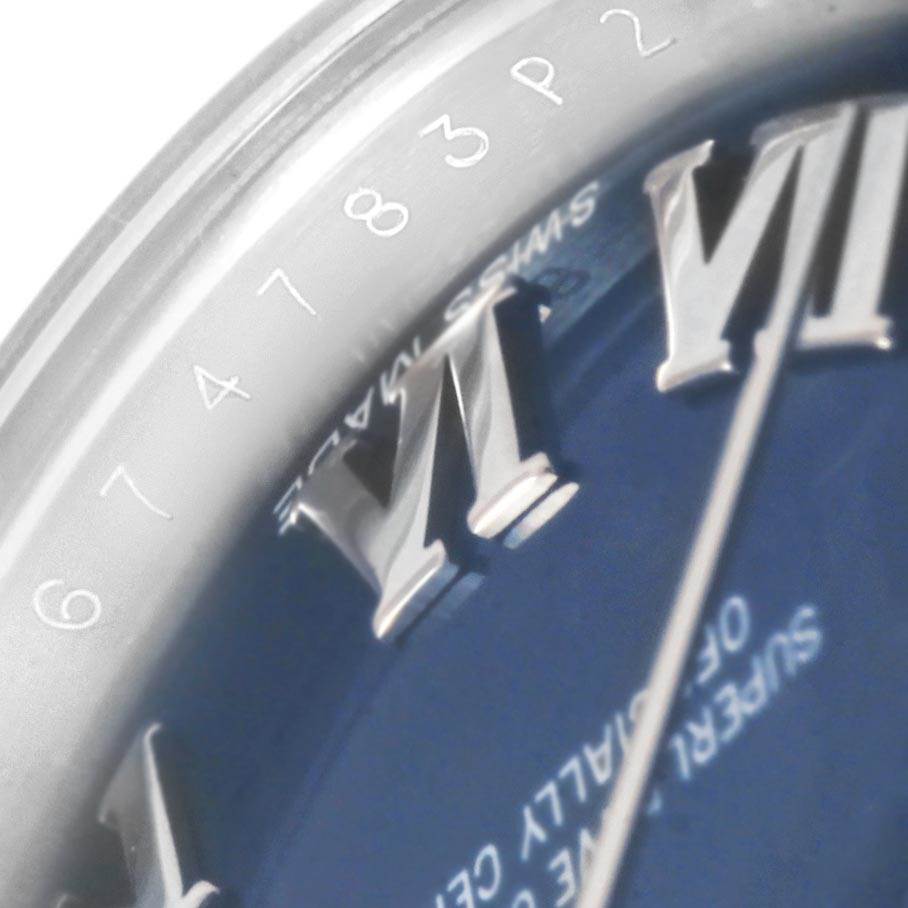Close-up of the Rolex Datejust 179160 Women's Stainless Steel Blue Dial 179160 Women's Stainless Steel Blue Dial watch showing part of the Roman numeral VI and the serial number.