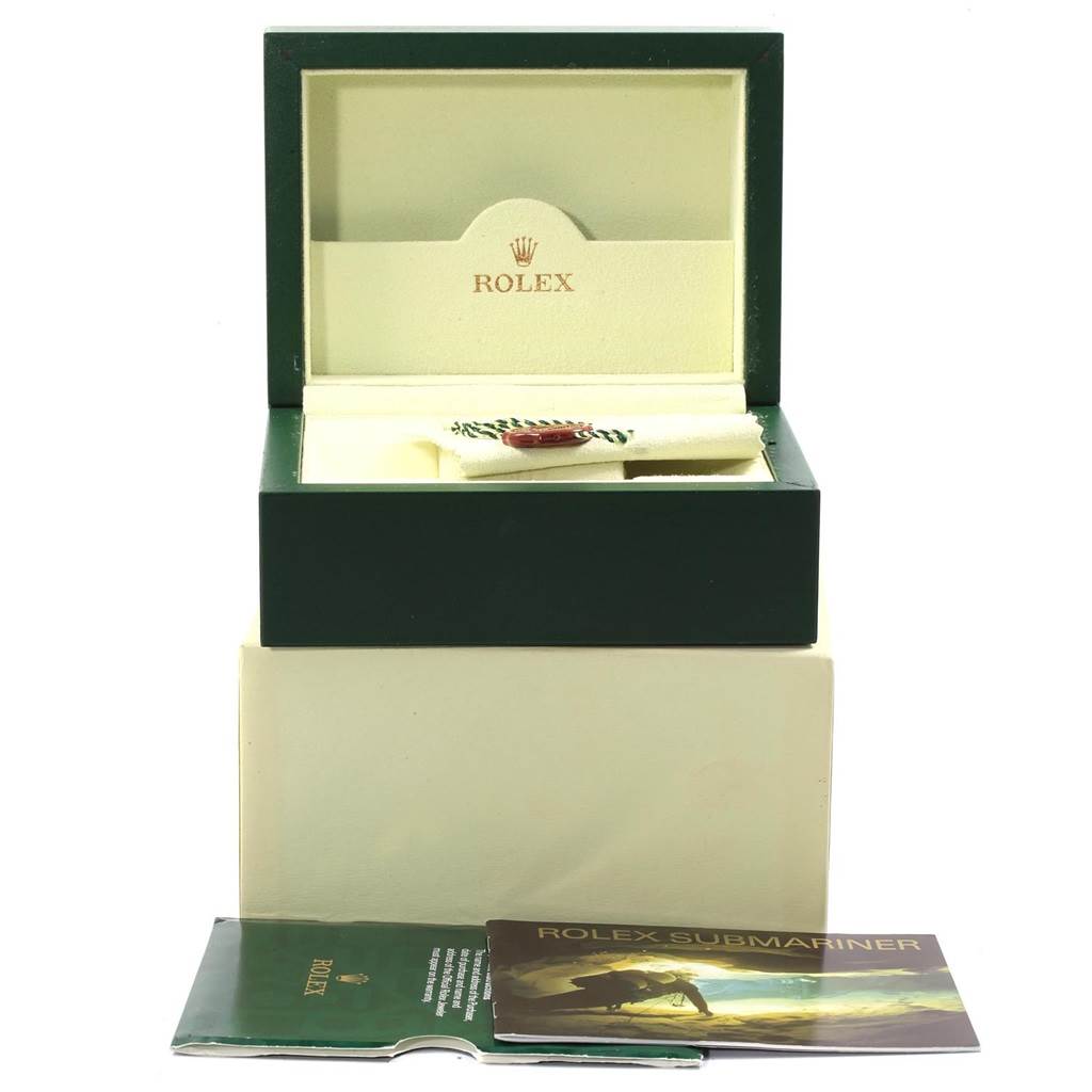 The image shows the open box and booklets for a Rolex Datejust 179174 Women
s Stainless Steel Black Dial 179174 Women
s Stainless Steel Black Dial watch from a front angle.