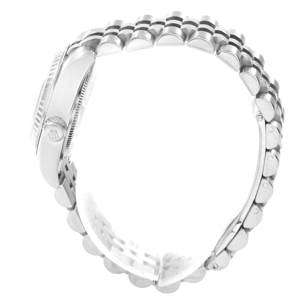 Side view of a Rolex Datejust 179174 Women's Stainless Steel Black Dial 179174 Women's Stainless Steel Black Dial watch showing the bracelet and case.