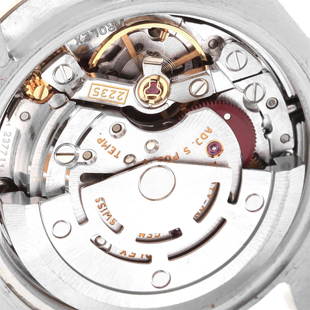 This is a close-up view of the inner mechanical movement of a Rolex Datejust 179174 Women's Stainless Steel Silver Dial 179174 Women's Stainless Steel Silver Dial watch, showing gears and components.