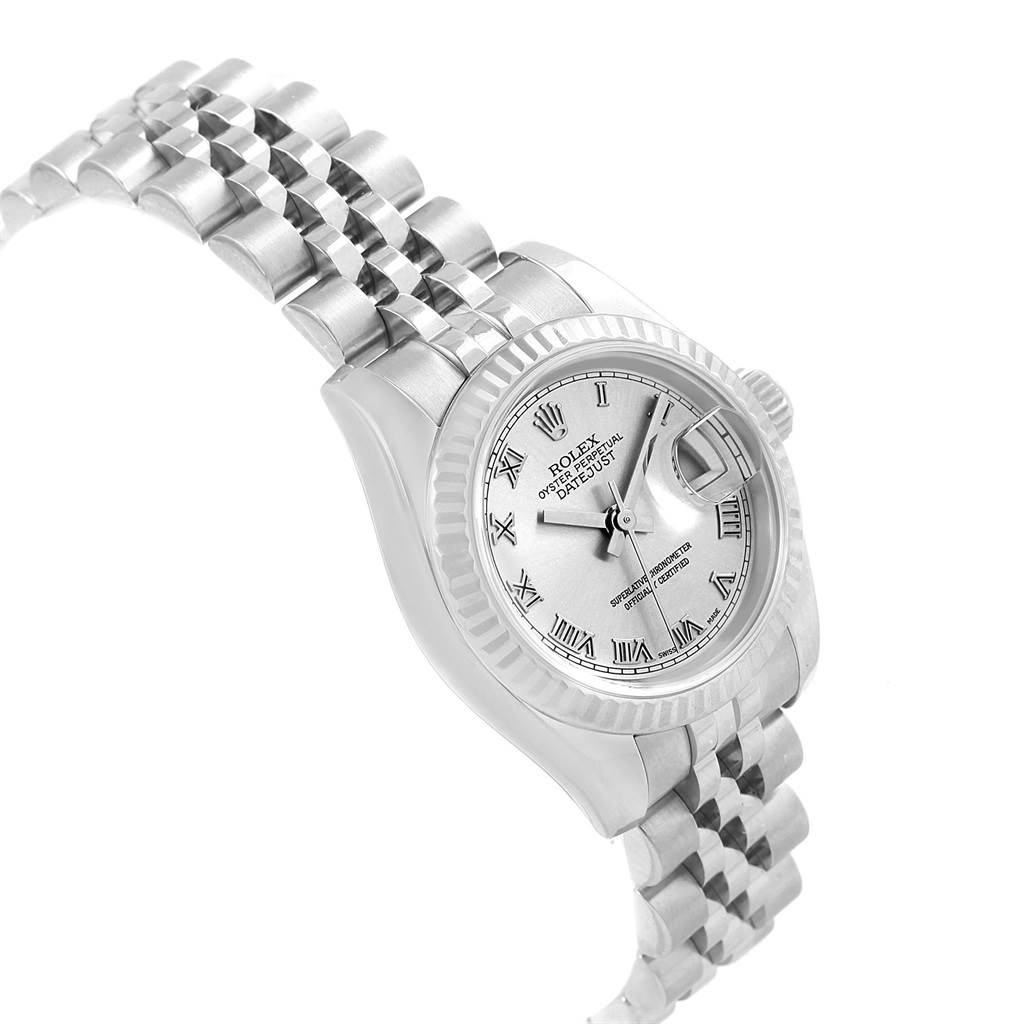 The Rolex Datejust 179174 Women's Stainless Steel Silver Dial 179174 Women's Stainless Steel Silver Dial watch is shown at an angled side view displaying its face, bezel, and bracelet.