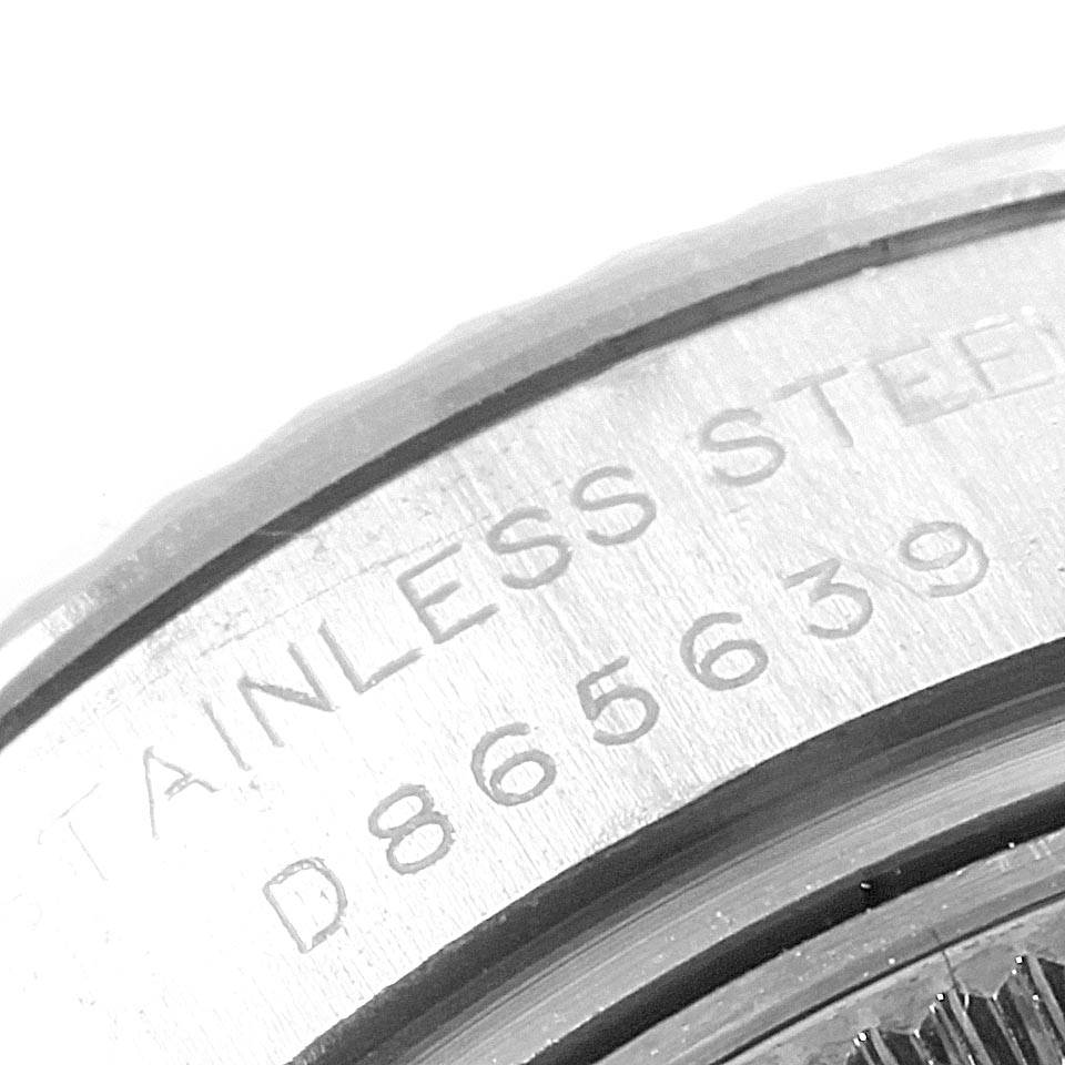 The image shows a close-up of the case back with engravings on a Rolex Datejust 179174 Women's Stainless Steel Pink Dial 179174 Women's Stainless Steel Pink Dial model watch.