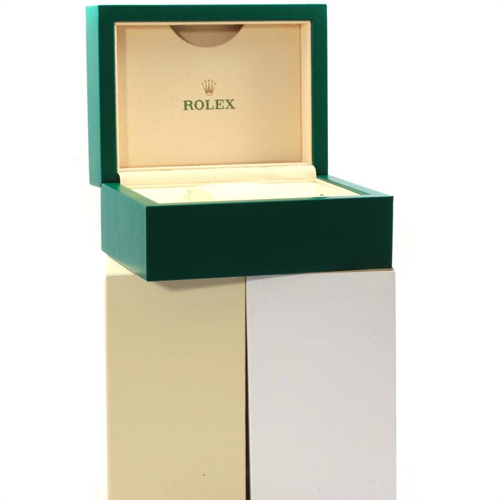 The image shows the opened green and beige box of a Rolex Datejust 179174 Women's Stainless Steel Pink Dial 179174 Women's Stainless Steel Pink Dial watch, featuring the logo inside the lid.