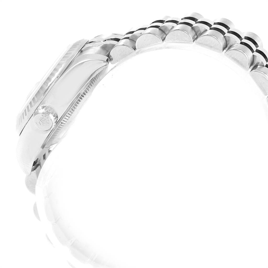 The image shows a side view of the Rolex Datejust 179174 Women's Stainless Steel Pink Dial 179174 Women's Stainless Steel Pink Dial watch, highlighting its case, bezel, and part of the bracelet.