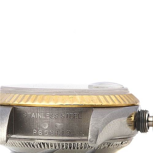 This image shows a side view of the Rolex Datejust 79173 Women's Stainless Steel Beige Dial 79173 Women's Stainless Steel Beige Dial watch casing, highlighting the stainless steel and gold bezel.