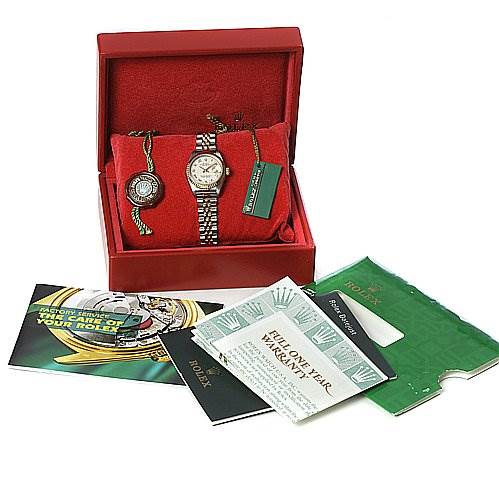 The image shows a Rolex Datejust 79173 Women's Stainless Steel Beige Dial 79173 Women's Stainless Steel Beige Dial watch in its box along with tags, a warranty card, and instruction manuals.