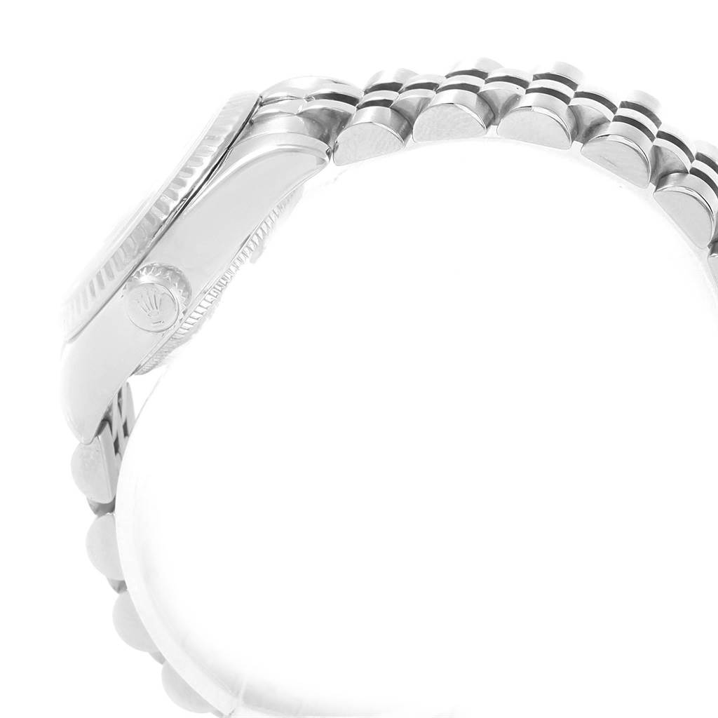 The side angle of a Rolex Datejust 179174 Women's Stainless Steel Mother of Pearl Dial 179174 Women's Stainless Steel Mother of Pearl Dial watch shows the case and crown, along with the bracelet's link detail.