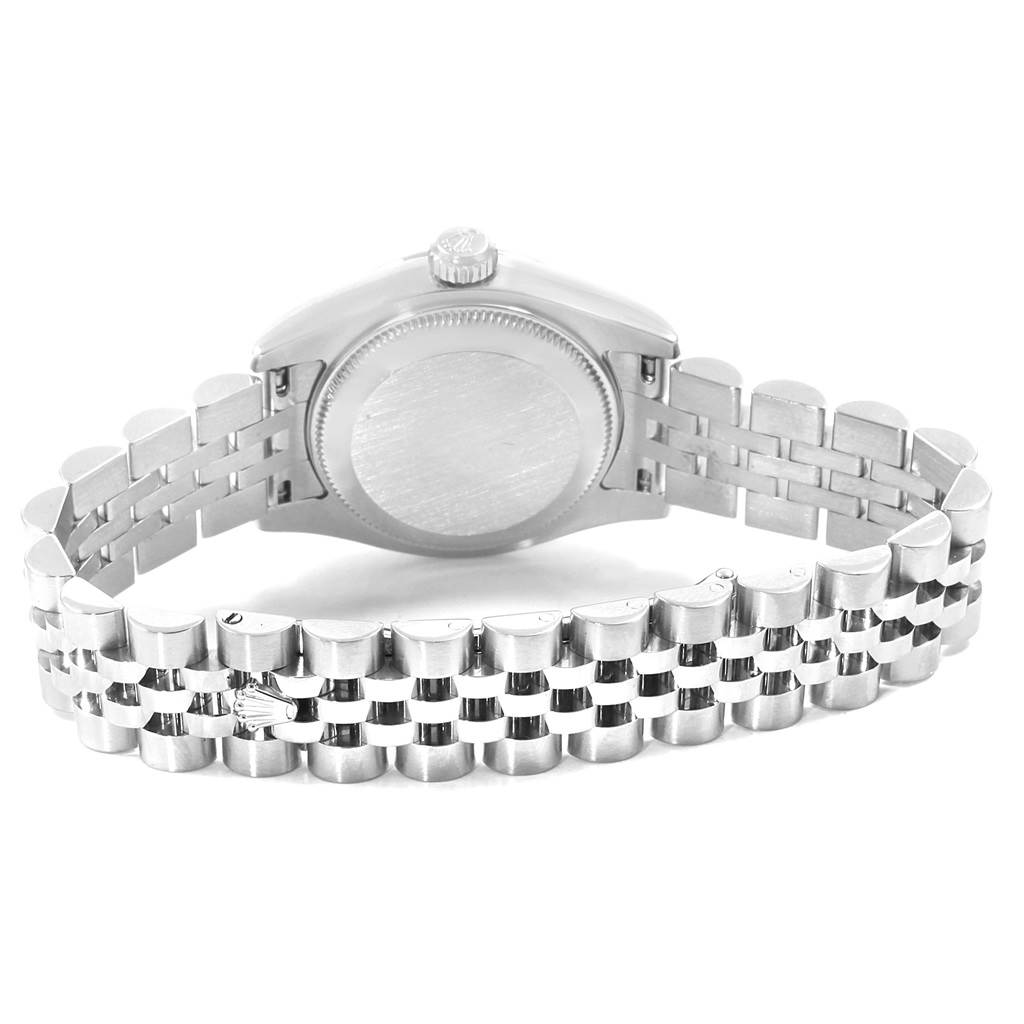 The image shows the back of the Rolex Datejust 179174 Women's Stainless Steel Mother of Pearl Dial 179174 Women's Stainless Steel Mother of Pearl Dial watch, specifically highlighting the case back and bracelet.