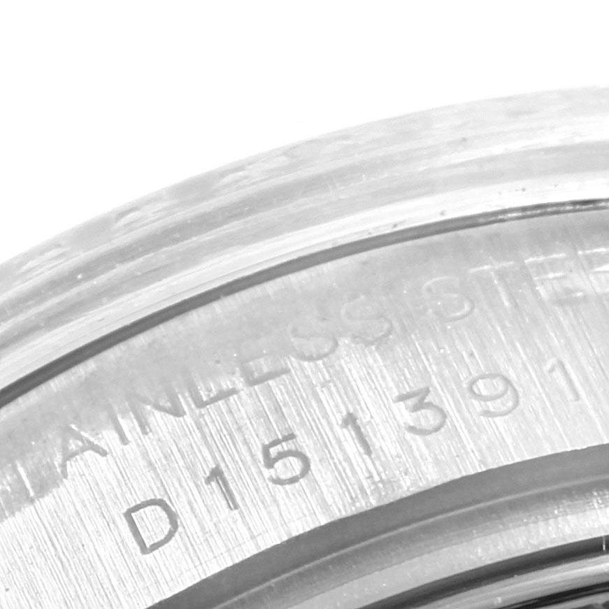 This image shows a close-up of the engraved stainless steel back case of a Rolex Datejust 179174 Women's Stainless Steel Mother of Pearl Dial 179174 Women's Stainless Steel Mother of Pearl Dial watch.