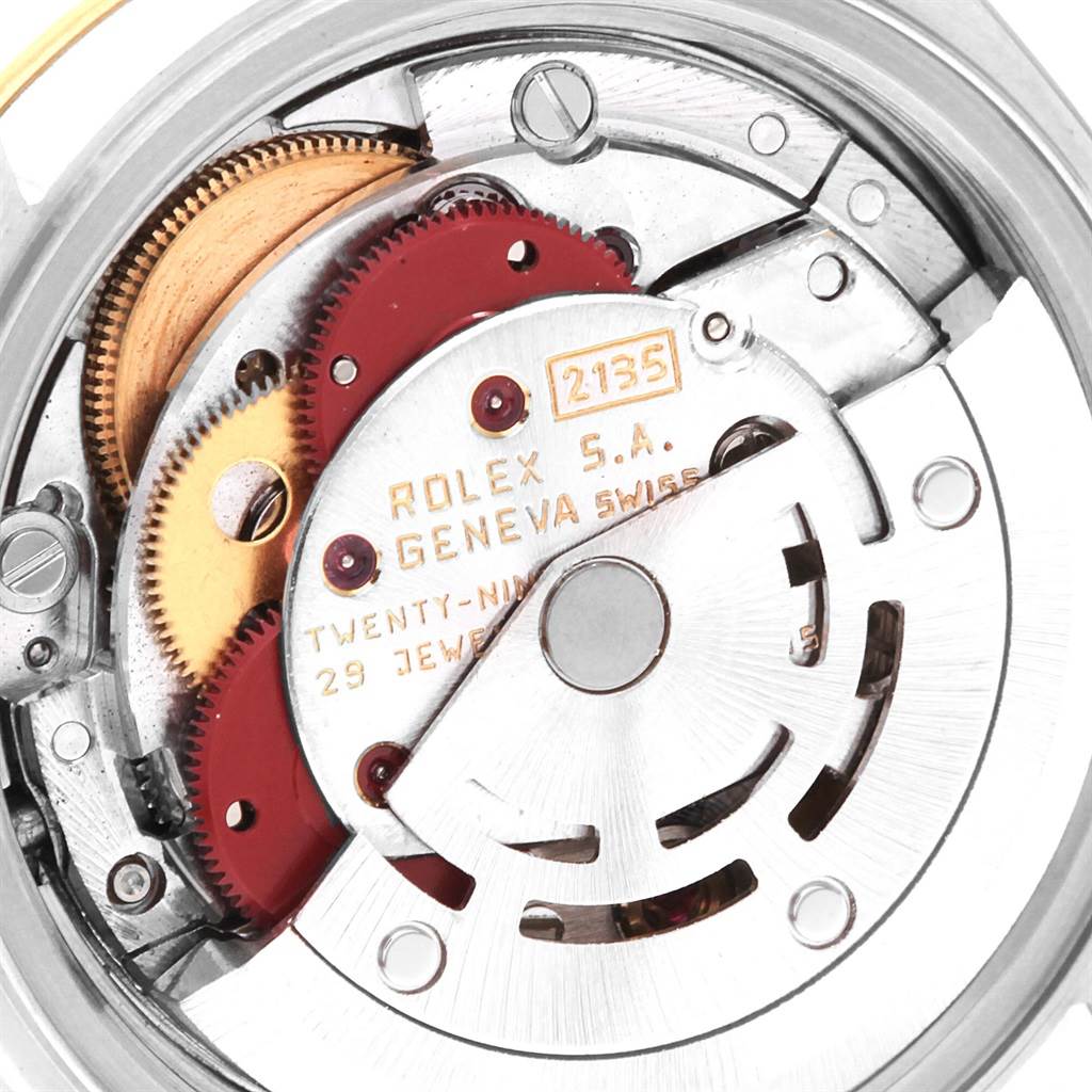 This is a close-up view of the mechanical movement inside a Rolex Datejust 69173 Women's Stainless Steel Black Dial 69173 Women's Stainless Steel Black Dial watch.