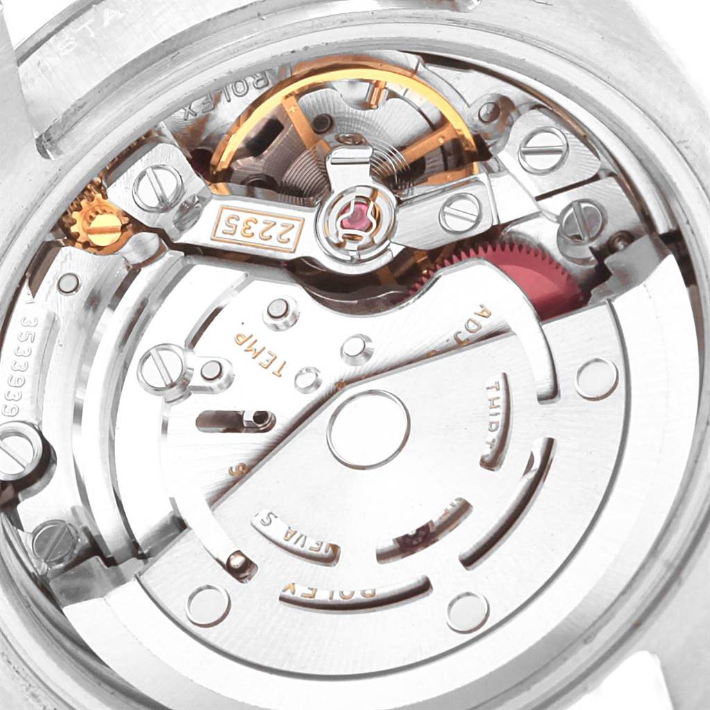 The image shows a close-up of the Rolex Datejust 179160 Women's Stainless Steel Silver Dial 179160 Women's Stainless Steel Silver Dial watch movement, including the rotor, gears, and other intricate components.