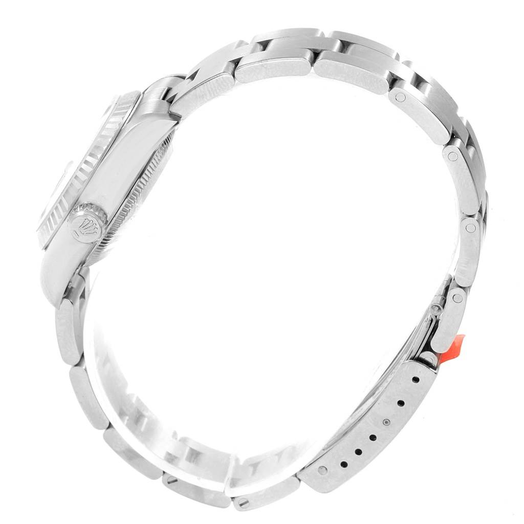 The image shows a side profile of a Rolex Datejust 79174 Women's Stainless Steel Black Dial 79174 Women's Stainless Steel Black Dial watch, highlighting its bracelet and case.