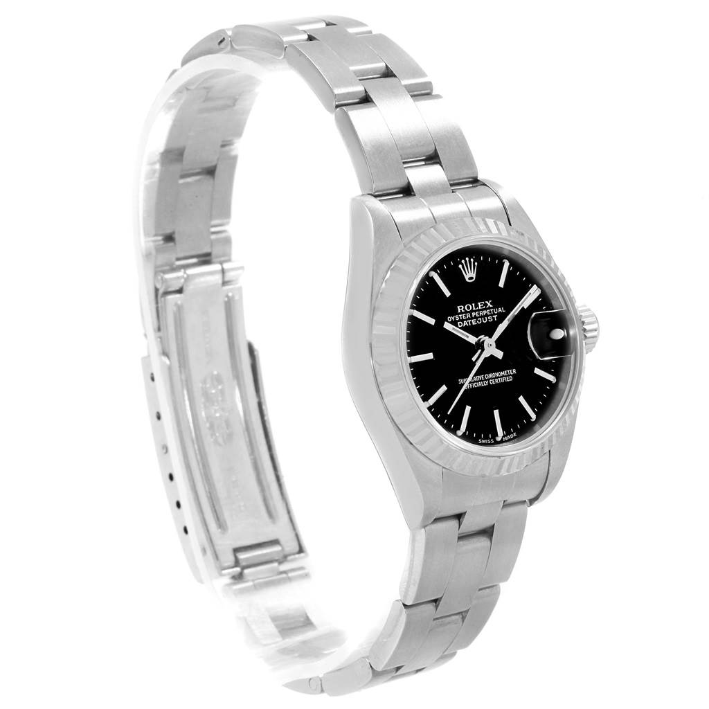 This image shows a side angle of a Rolex Datejust 79174 Women's Stainless Steel Black Dial 79174 Women's Stainless Steel Black Dial watch, displaying the bracelet, clasp, and face with a fluted bezel.