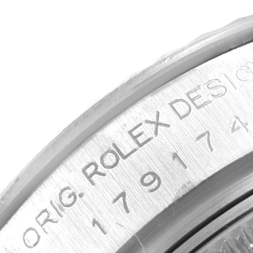 This image shows a close-up of the engraved back casing of a Rolex Datejust 179174 Women's Stainless Steel Black Dial 179174 Women's Stainless Steel Black Dial watch.