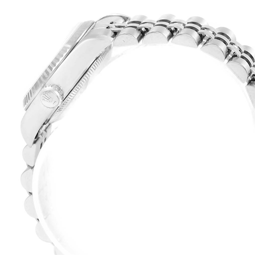 The image shows a side view of a Rolex Datejust 79174 Women's Stainless Steel Mother of Pearl Dial 79174 Women's Stainless Steel Mother of Pearl Dial watch, focusing on the case, crown, and part of the Jubilee bracelet.