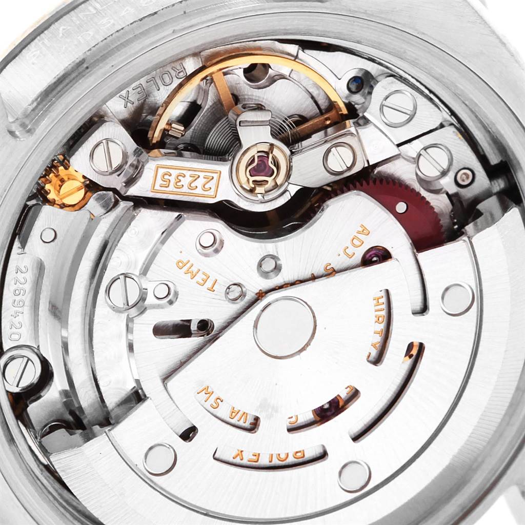 The image shows the intricate internal mechanism of the Rolex Datejust 179174 Women
s Stainless Steel White Dial 179174 Women
s Stainless Steel White Dial watch, viewed from the back.