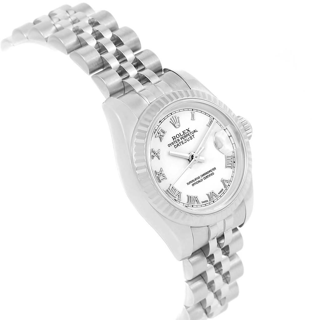 This image shows a Rolex Datejust 179174 Women
s Stainless Steel White Dial 179174 Women
s Stainless Steel White Dial watch from a left-side angle, highlighting the dial, case, and partially visible bracelet.