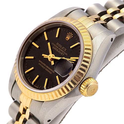 This image shows a close-up angled view of a Rolex Datejust 69173 Women's Stainless Steel Black Dial 69173 Women's Stainless Steel Black Dial watch, highlighting the dial, fluted bezel, crown, and part of the bracelet.