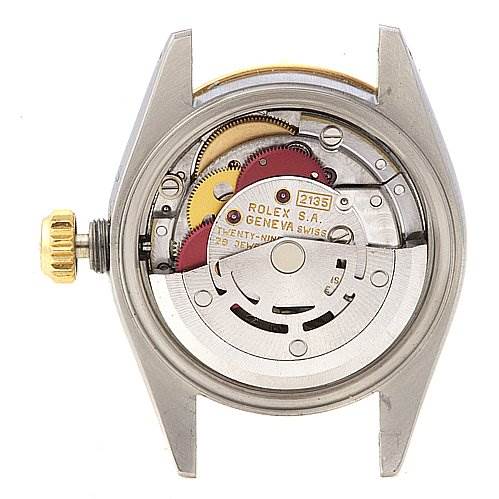 The image shows the back view of a Rolex Datejust 69173 Women's Stainless Steel Black Dial 69173 Women's Stainless Steel Black Dial watch, exposing its internal movement mechanism.